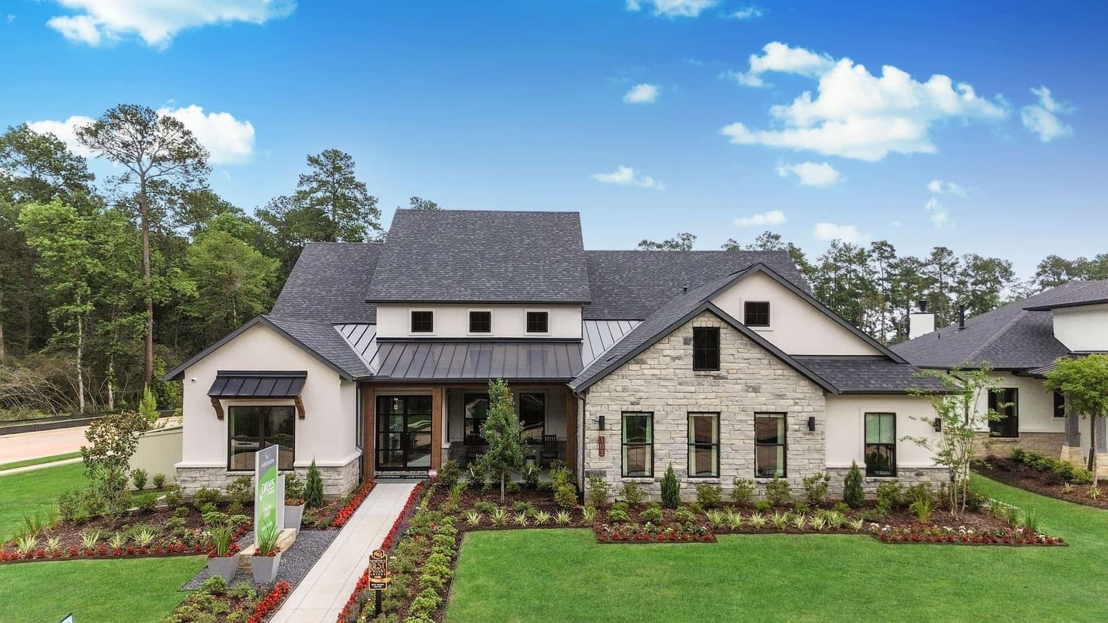 Aerial front view of a white Houston home photographed by Lexma drone